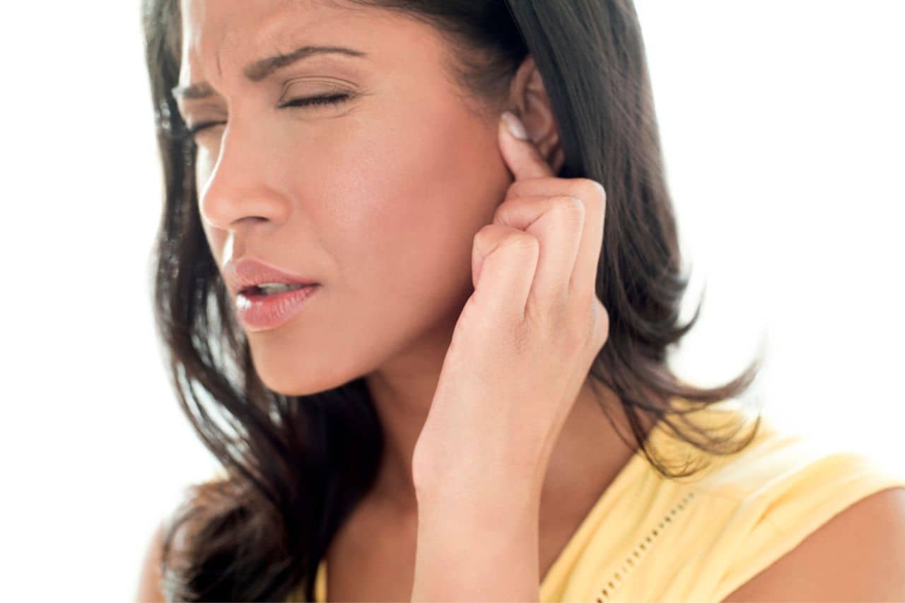 Woman with ear pain