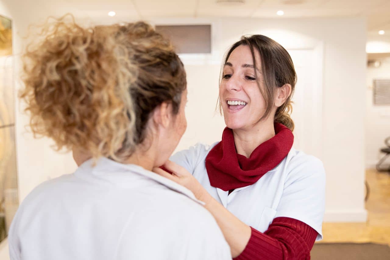 A speech therapist with a patient