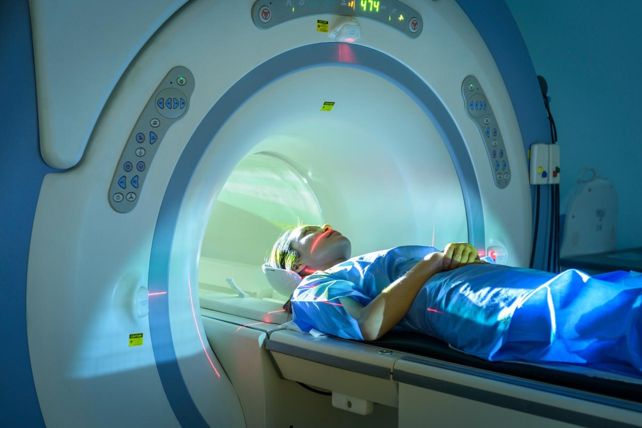Patient lying in an MRI machine during a scanning procedure