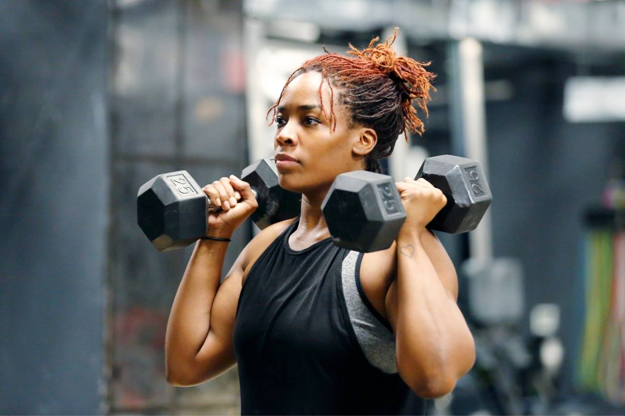 Woman exercising with weights