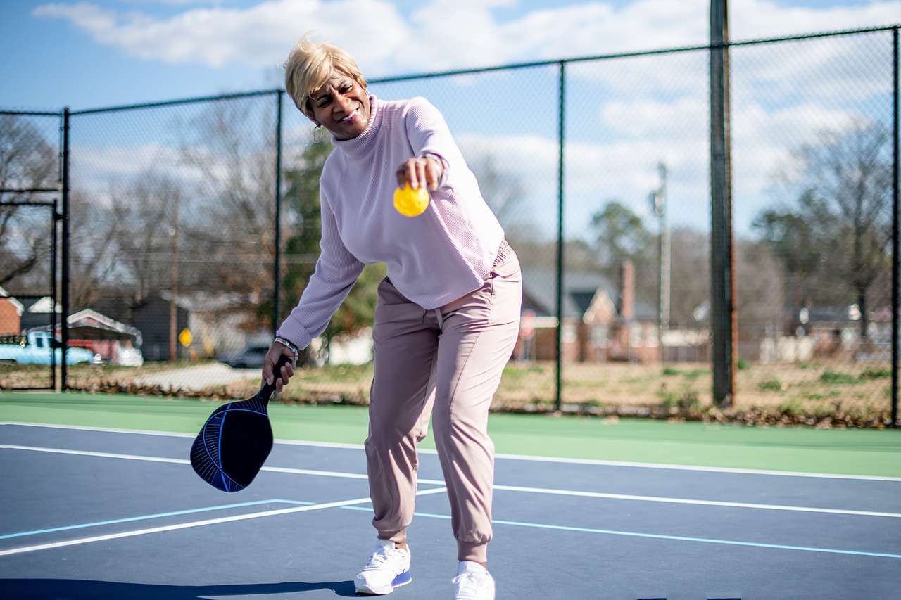 Senior woman playing pickleball