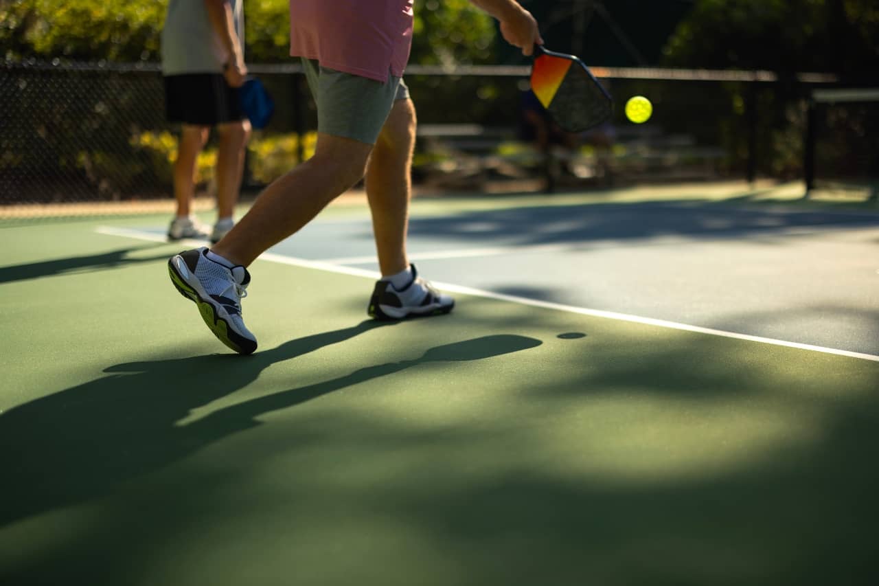 Shoes of someone playing pickleball