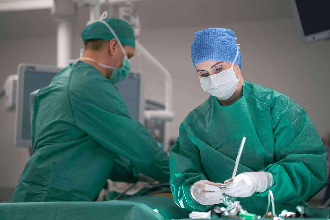 Two surgeons doing surgery