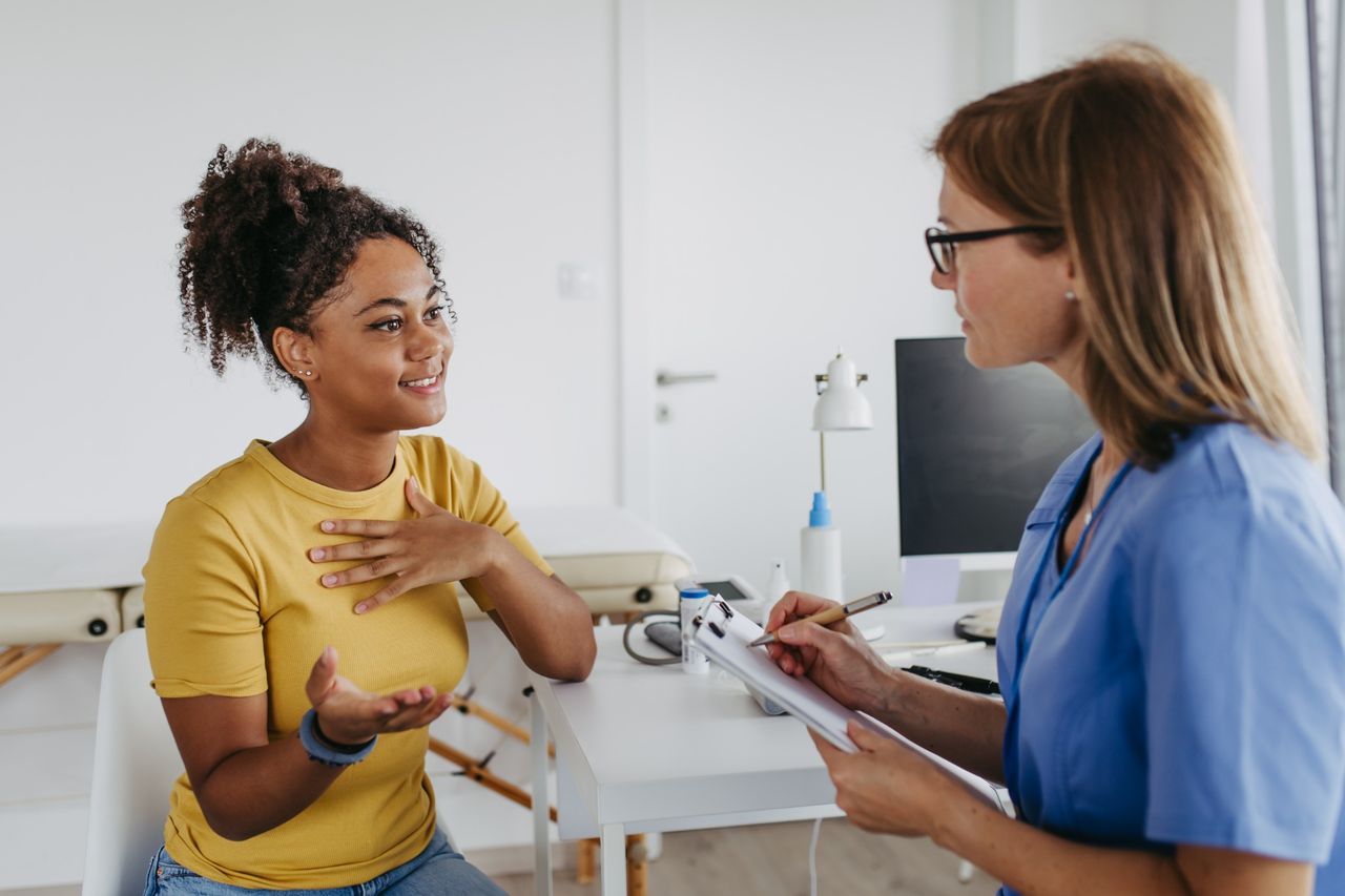 Doctor and patient talking
