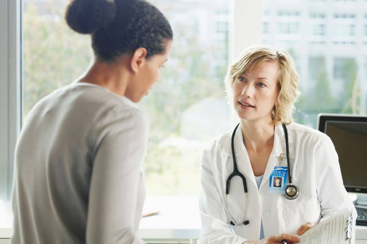 Woman in a conversation with a doctor