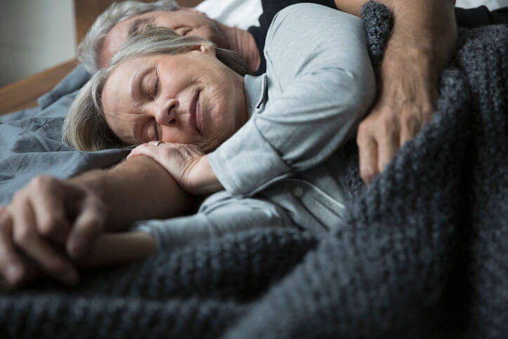 Two older adults sleeping